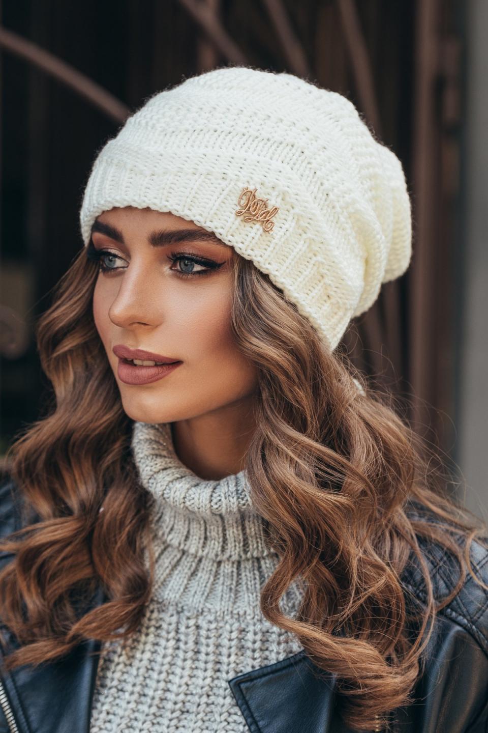 Warm women&#39;s knitted hat &quot;Lyra&quot; (milky)