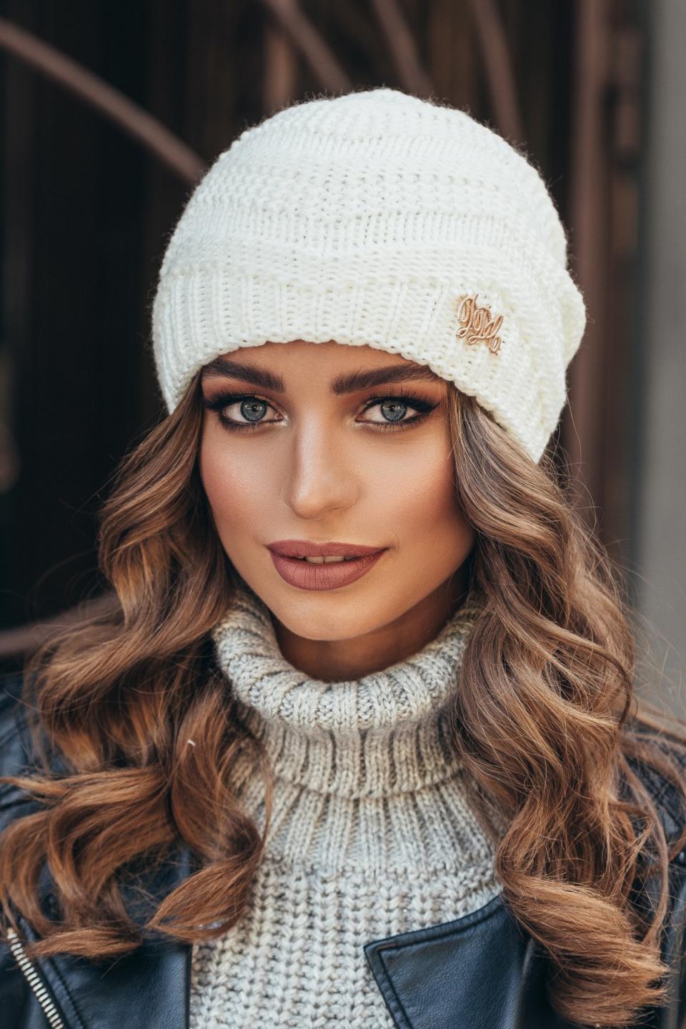 Warm women&#39;s knitted hat &quot;Lyra&quot; (milky)