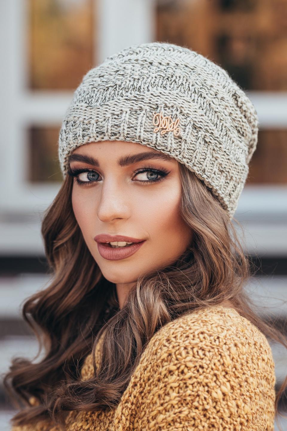 Warm women&#39;s knitted hat &quot;Lyra&quot; (linen-olive melange)